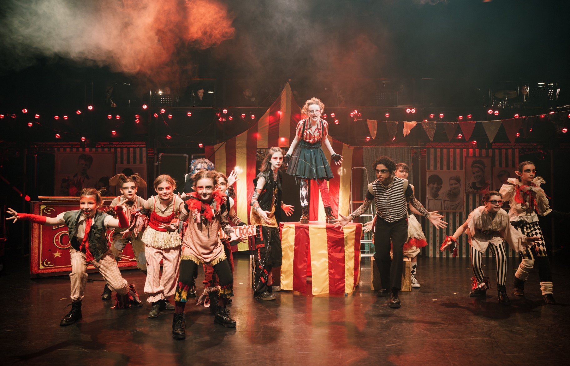 Ringaling's Goblin Circus troupe in a choreographed ensemble number.